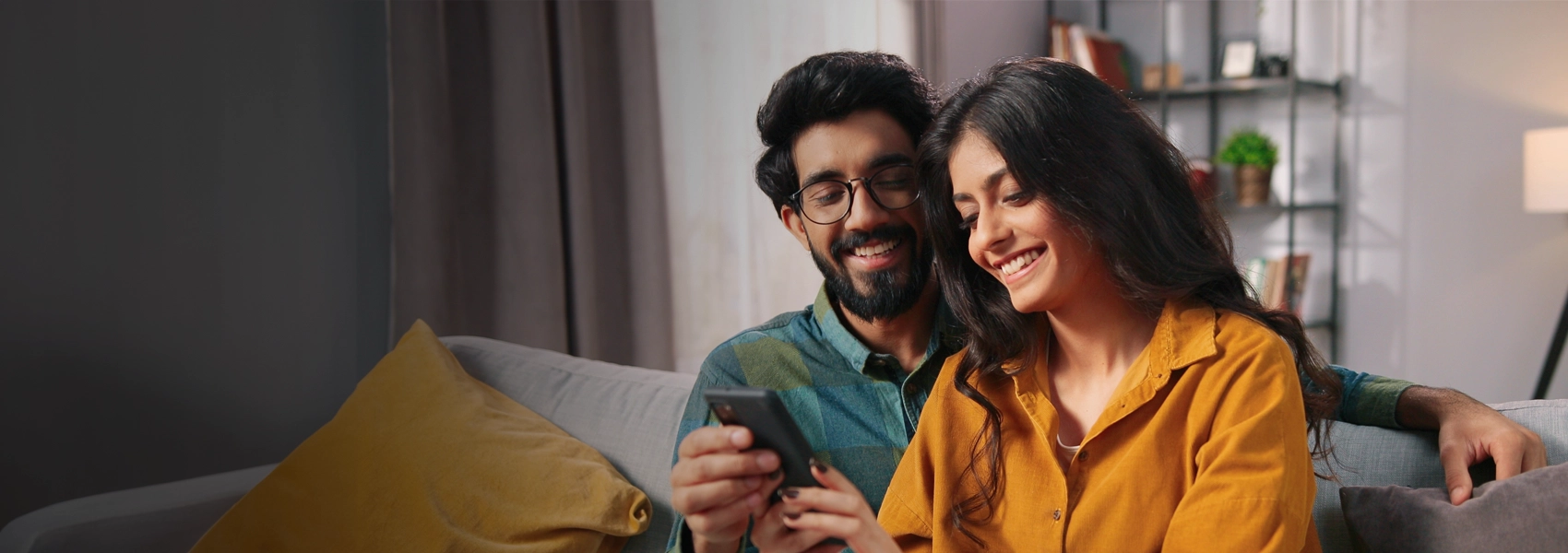 Couple sitting on a couch